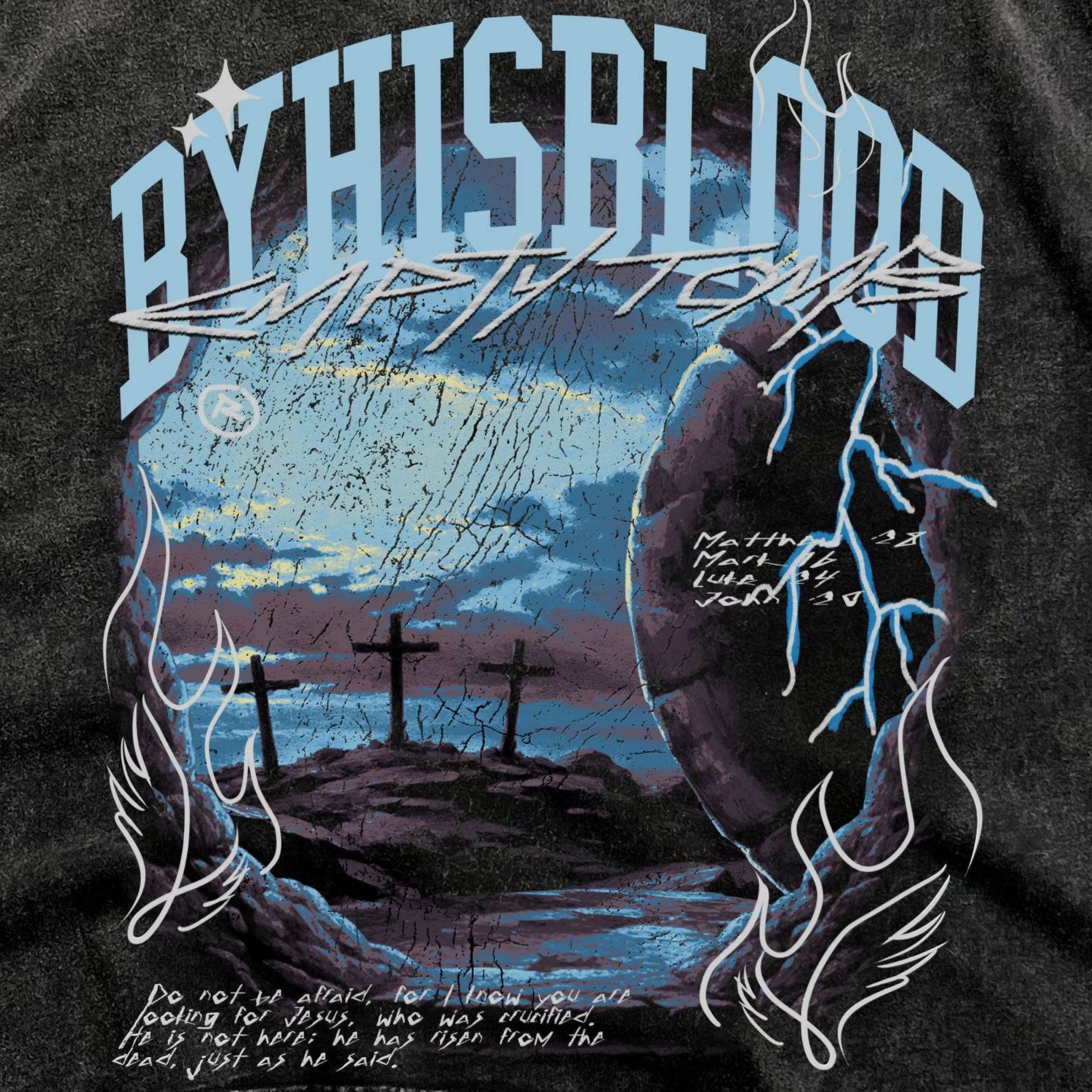 T-shirt with artistic design of crosses, wings, and text on a dark background